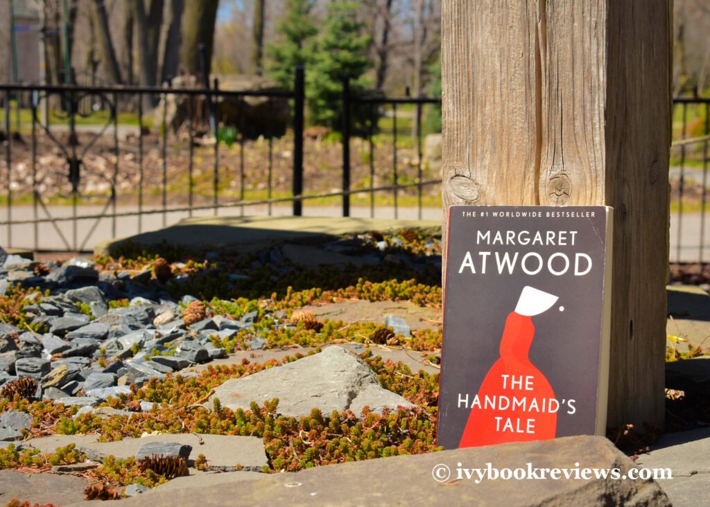 Picture of the book THE-HANDMAID'S-TALE on nature's floor